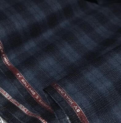 12% Wool TR Check Suiting Fabric Blends Classic Elegance With Modern Refinement.